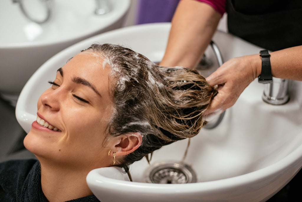 woman having her hair washed salon